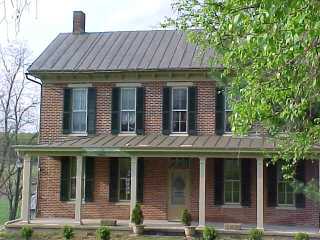 Brick color and roof color--both bronze--are blending well