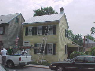 Setup for preserving traditional roof over cottage