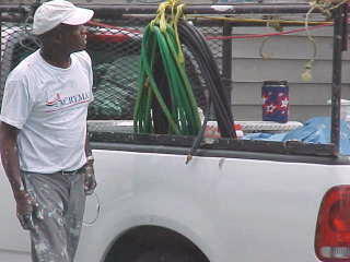 Roof Menders' crew chief Lester Mobley