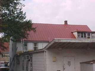 Traditional red coatin over historic post office