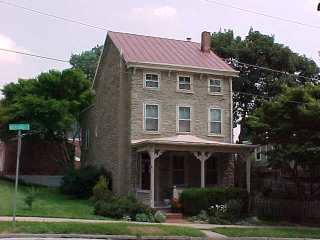 Old farmhouse roof coated by Roof Menders