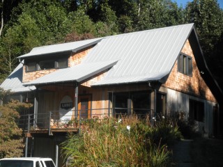 Modern standing seam roof with fully reinforced system done by Roof Menders