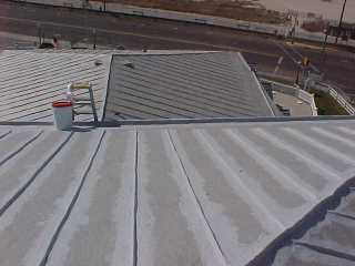 Roof Menders cuts in the top coats into the crimped standing seams