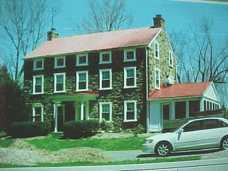 Stone house in Pennsylvana countryside awaiting Roof Menders work