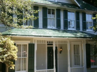 Fully reinforced embossed tin shingle surface