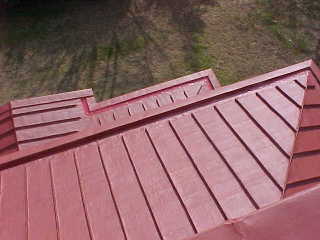 Roof Menders on Delaware lighthouse old metal roof