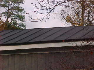 Final image of roof of bungalow with tin roof color