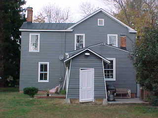 Back view after project completed by Roof Menders